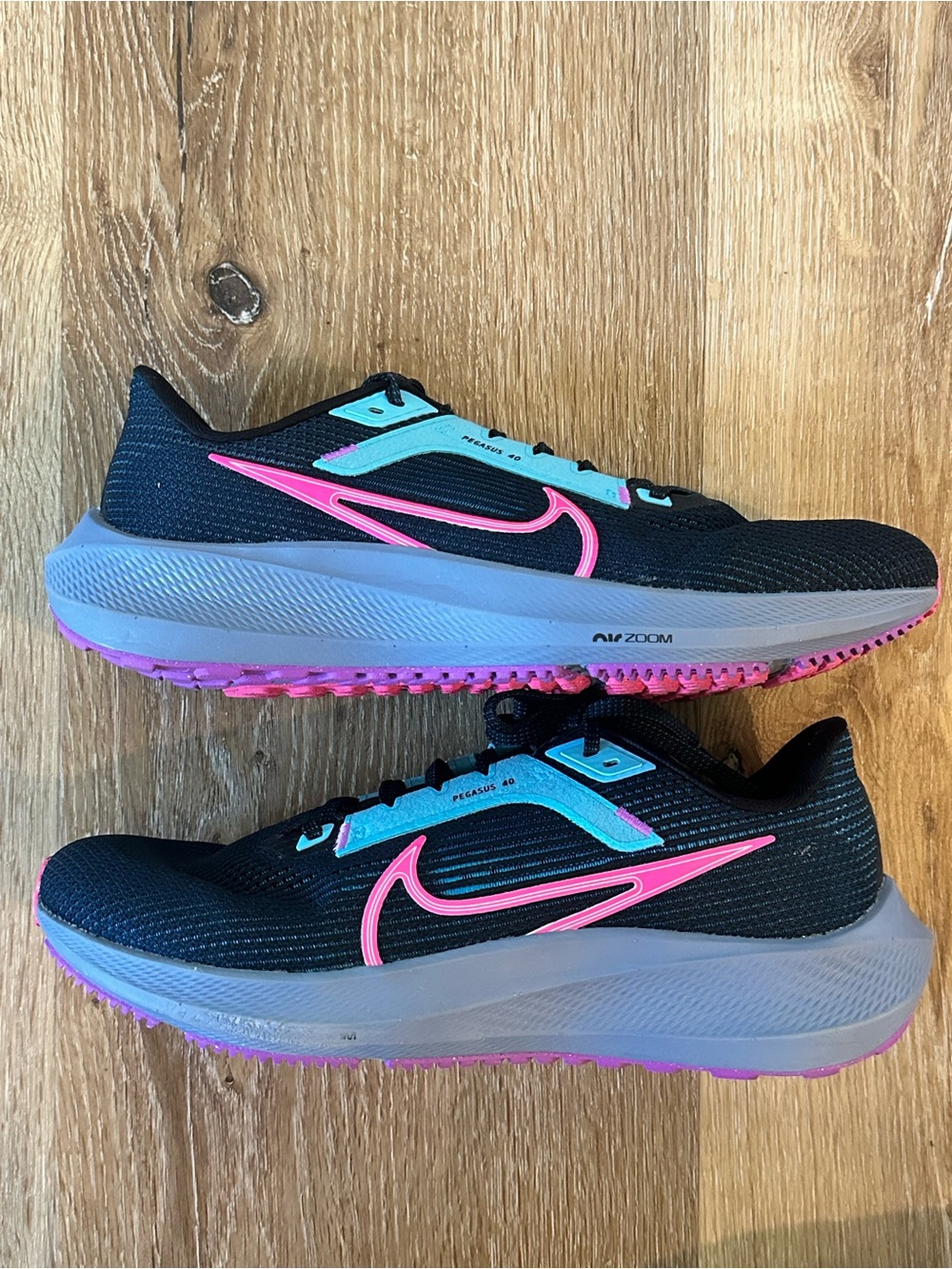 Nike Women's Black Running Shoes with Pink & Aqua Accents